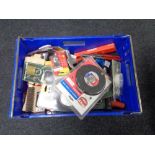 A crate of new tools, hack saws, LED shower light kit, padlocks,