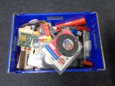 A crate of new tools, hack saws, LED shower light kit, padlocks,