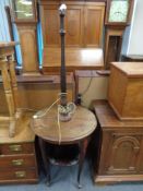 A nineteenth century mahogany circular table fitted a lamp