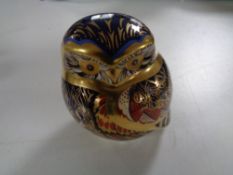 A Royal Crown Derby china owl paperweight