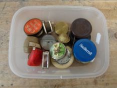 A box of a collection of sewing tape measures