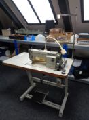 A Mitsubushi SL-210 industrial sewing machine in table