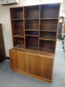 A mid century Danish sliding door bookcase