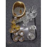 A tray of glass ware, pressed glass water jug, wine glasses,