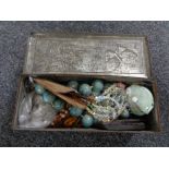 An vintage Jacobs tin containing costume jewellery, necklaces,