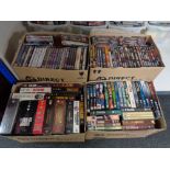 Four boxes of DVDs and DVD box sets - Indiana Jones, Clint Eastwood,