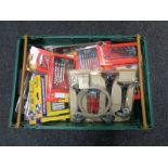 A crate of new tools, drill bits, precision screw drivers, staple gun,