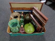 A box of pottery vases, glass bottles,