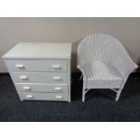 A painted 20th century four drawer chest and a wicker armchair