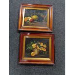 A pair of early twentieth century mahogany framed still life oils on panels