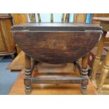 A small oak drop leaf table