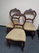 A set of three 19th century mahogany dining chairs