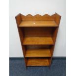 A set of narrow open shelves