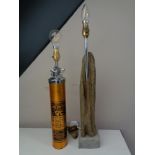 A vintage Nu-swift fire extinguisher converted to a table lamp together with a drift wood table