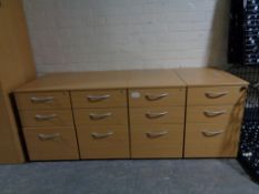 Four pine effect three drawer office chests