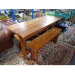A pine refectory kitchen table and two benches