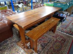 A pine refectory kitchen table and two benches