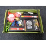 A crate of new tools, wall scrapers, torque wrench,