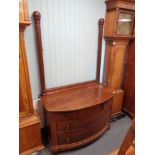 A nineteenth century mahogany bow fronted four drawer dressing chest (lacking mirror back)