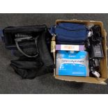 A box of Samsung Sony and Panasonic video cameras with accessories