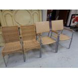 A pair of metal framed rattan conservatory armchairs and pair of similar chairs