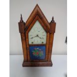 A late 19th century mahogany and pine Gothic mantel clock by the Ansonia clock company