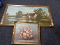 A large gilt framed oil on canvas of a cottage by a river, gilt framed still life signed C.