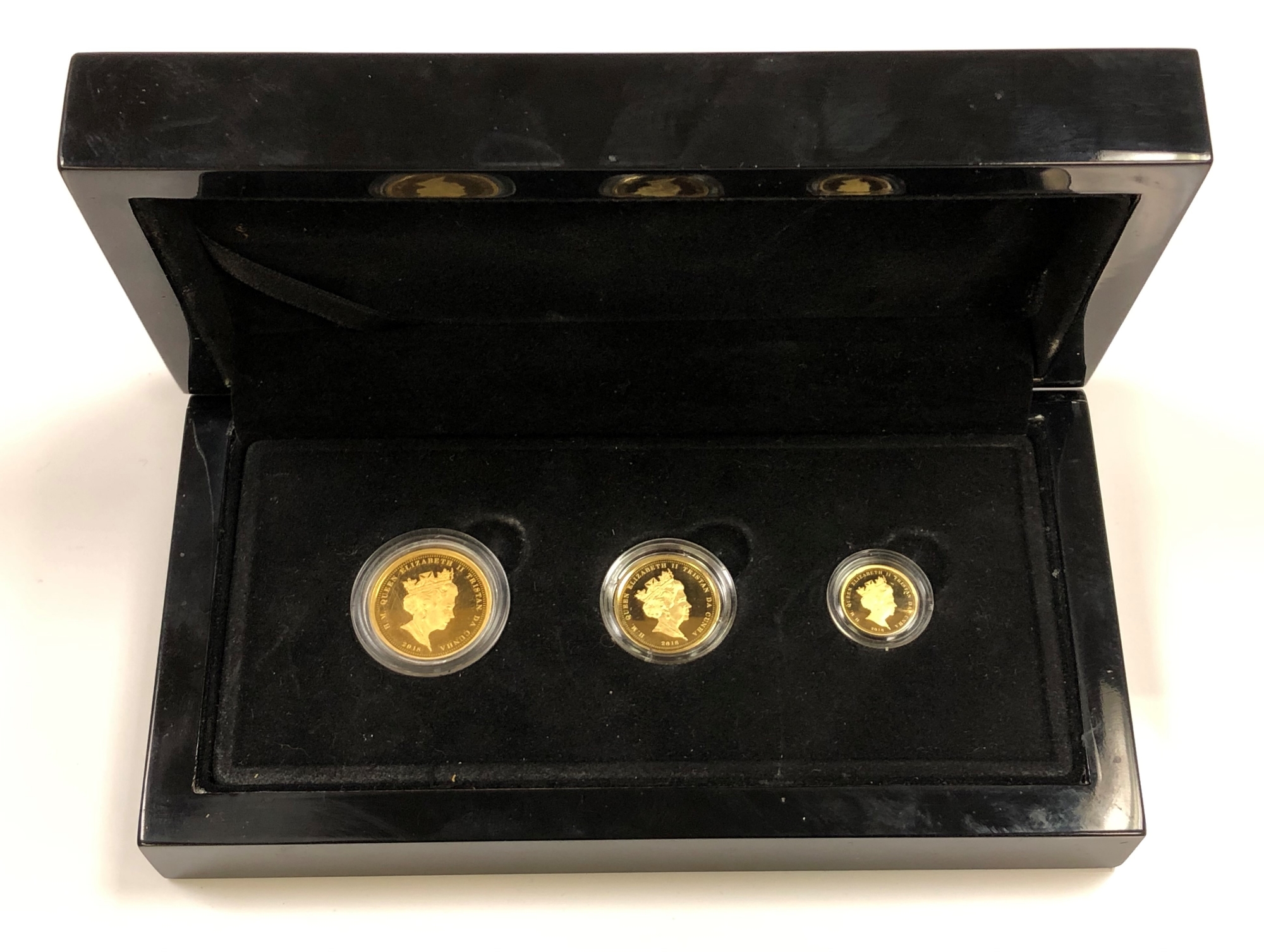 A cased Elizabeth II full gold sovereign, half sovereign and quarter sovereign 2018,