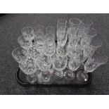 A tray of crystal, champagne flutes,