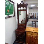 A reproduction mahogany Victorian style hall stand