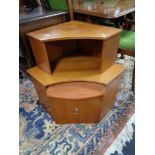 A teak corner stand