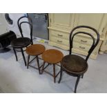 A pair of Bentwood dining chairs together with a pair of pub style stools