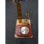 A tray of brass art nouveau table lamp, artisan amber tinted glass vase,