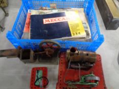 A basket of three scratch built Meccano steam engines together with a quantity of Meccano magazines