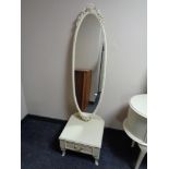 A cream and gilt cheval mirror