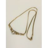 A 9ct gold diamond set heart pendant necklace.