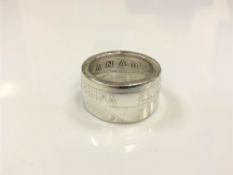 A Canadian silver dollar ring