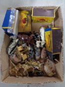 A box of hand painted lead animal figures together with matchbox series A Moko lesney vehicles