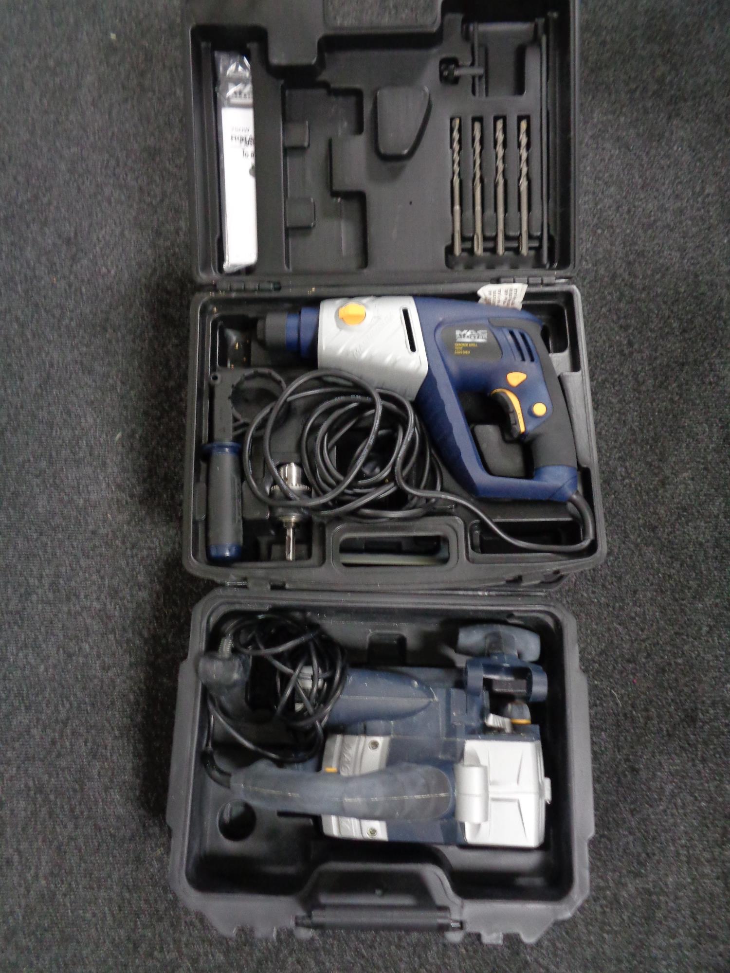 Two cased Macallister power tools - 750 watt hammer drill and Belt sander