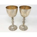 A pair of Elizabeth II silver gilt goblets, Garrard & Co.