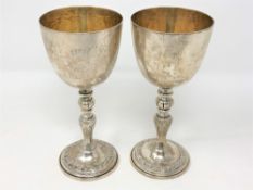 A pair of Elizabeth II silver gilt goblets, Garrard & Co.