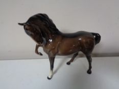 * Withdrawn * A Beswick brown gloss horse with front foot raised