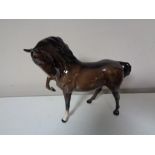 * Withdrawn * A Beswick brown gloss horse with front foot raised