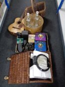 An acoustic guitar, wicker baskets, pie maker,