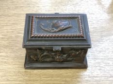 A miniature continental bronze ring casket, the panelled sides decorated with animals and birds,