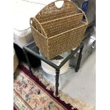 A metal glass topped lamp table together with a wicker magazine rack and light shade