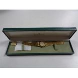 A boxed lady's Gucci wrist watch on bracelet strap