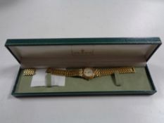 A boxed lady's Gucci wrist watch on bracelet strap