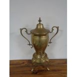 An early twentieth century brass twin handled samovar on stand