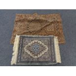 Two fringed rugs